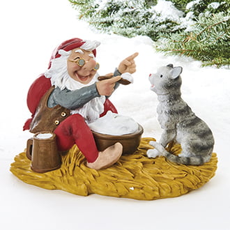 große Figur mit Weihnachtsmann mit Reisbrei und einer Katze, die nach Vilhelm Hansen schmeckt
