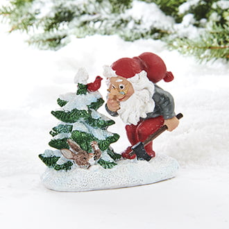 kleine Figur mit Weihnachtsmann und Hase beim Weihnachtsbaum fällen von Vilhelm Hansen
