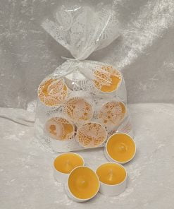 gelbe Teelichter im weißen Plastikbecher im Beutel zu 20 Stück
