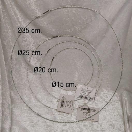 billede med fire metalringe med forskellige diameter