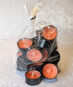 orange fyrfadslys i sort plastkop i pose med 20 styk