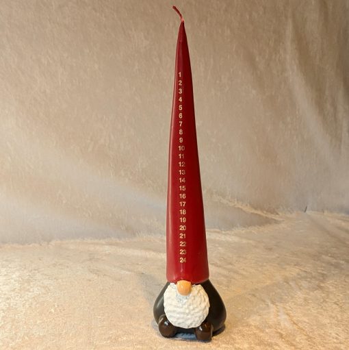 Kalenderkerze in Form einer Elfe mit einem roten Hut von 30 Zentimetern